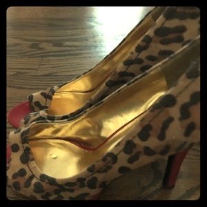 Candies cheetah print pumps with red accent